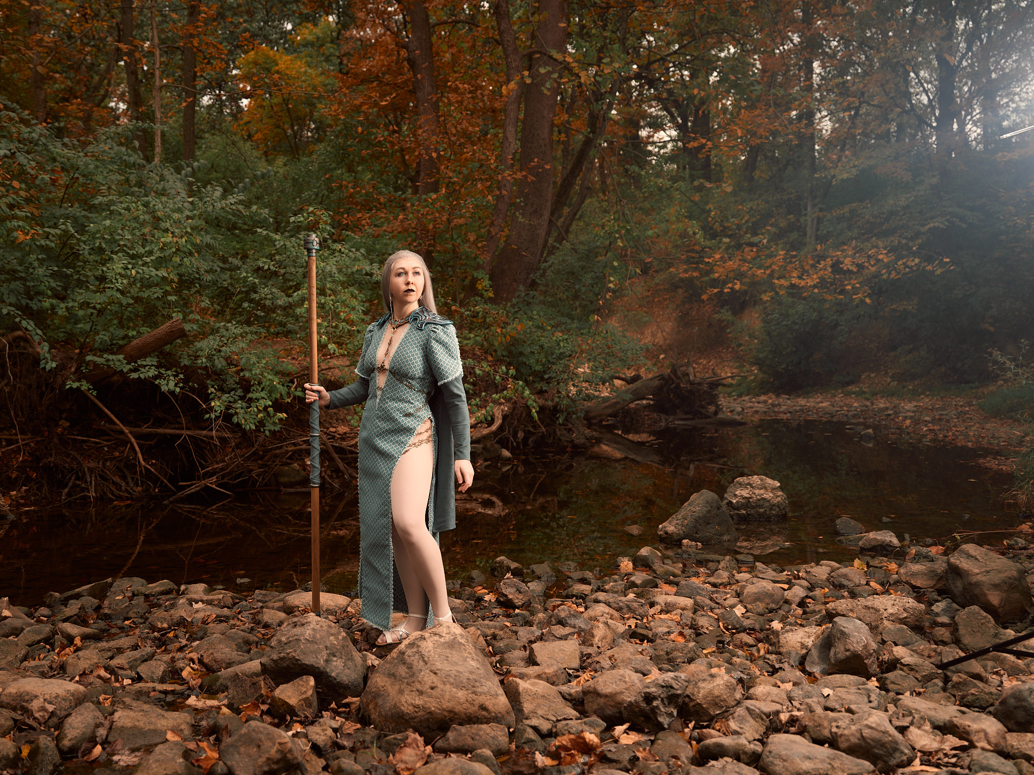 Rogue Heart Cosplay standing in the forest wearing the Wavemother's Robe.